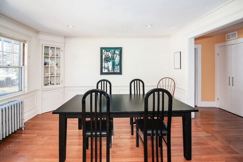 20 Stoneleigh Road, Unit 20 Newton, MA 02465 - Photo 5 of 30 a view of a a dining room with furniture window and wooden floor