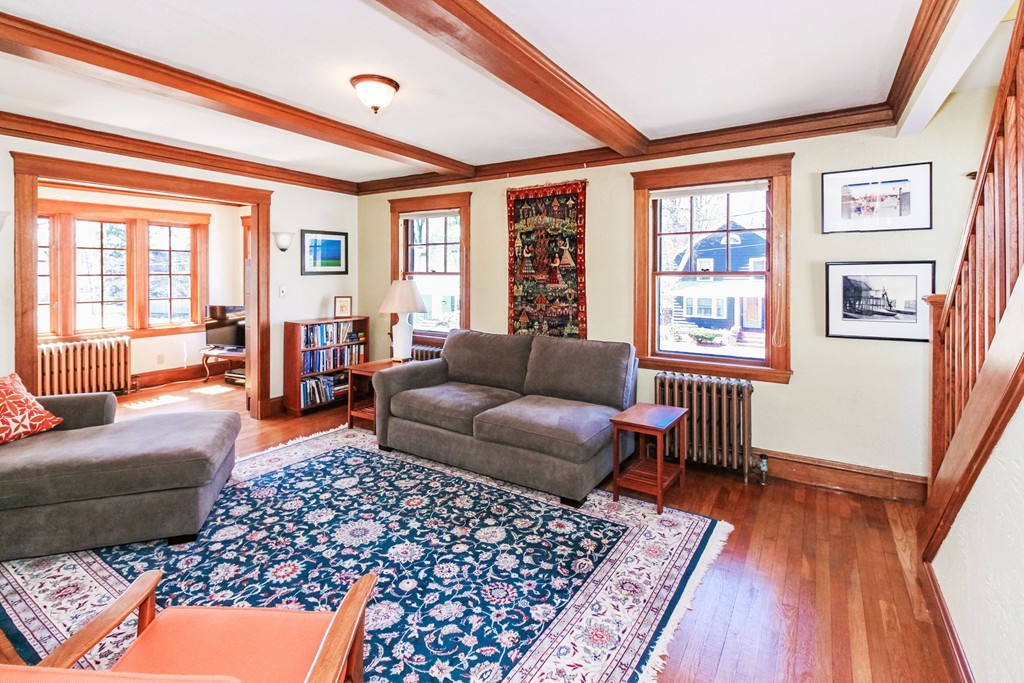 20 Stoneleigh Road, Unit 20 Newton, MA 02465 - Photo 7 of 30 a living room with furniture and a window