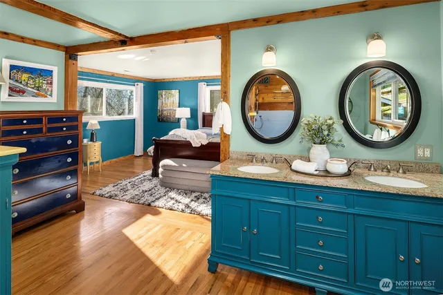 a view of bathroom with a shower and a sink
