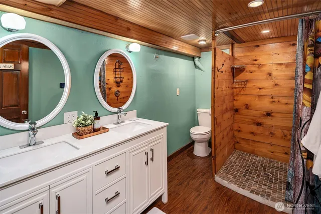 a view of swimming pool with lounge chairs