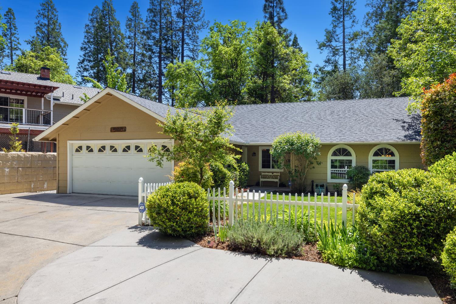 39398 Robin Bass Lake, CA 93604 - Photo 2 of 31 a front view of a house with garden