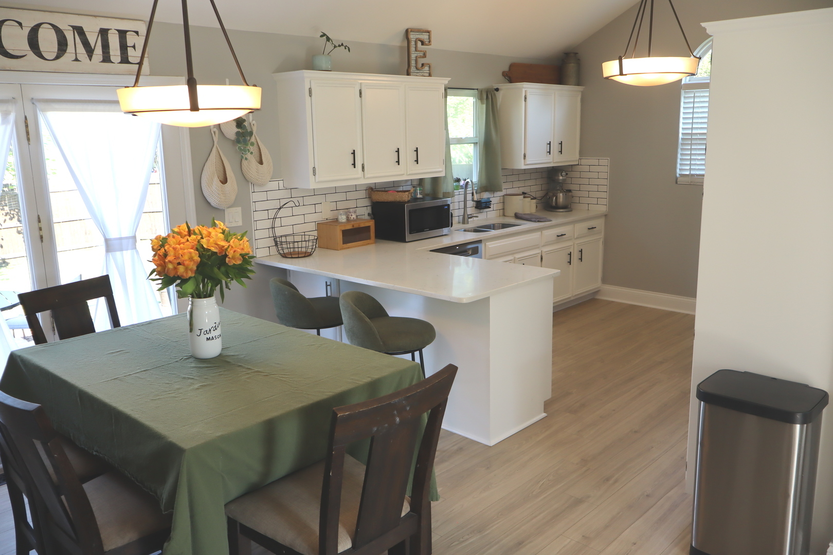 24930 Cashel Bay Road Manhattan, IL 60442 - Photo 8 of 24 a kitchen with a table and chairs