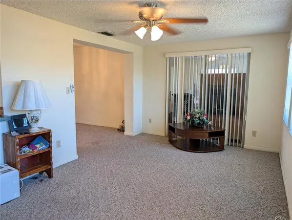 a view of an empty room and window