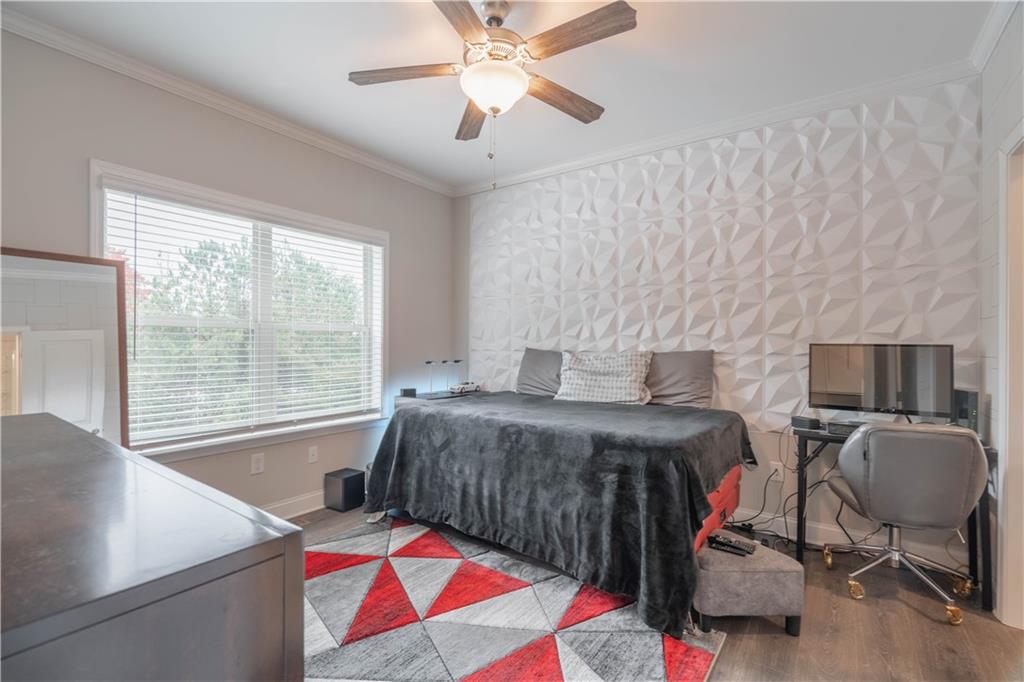 3110 Quantum Lane, Unit 53 Atlanta, GA 30341 - Photo 17 of 38 a bedroom with a bed and a desk