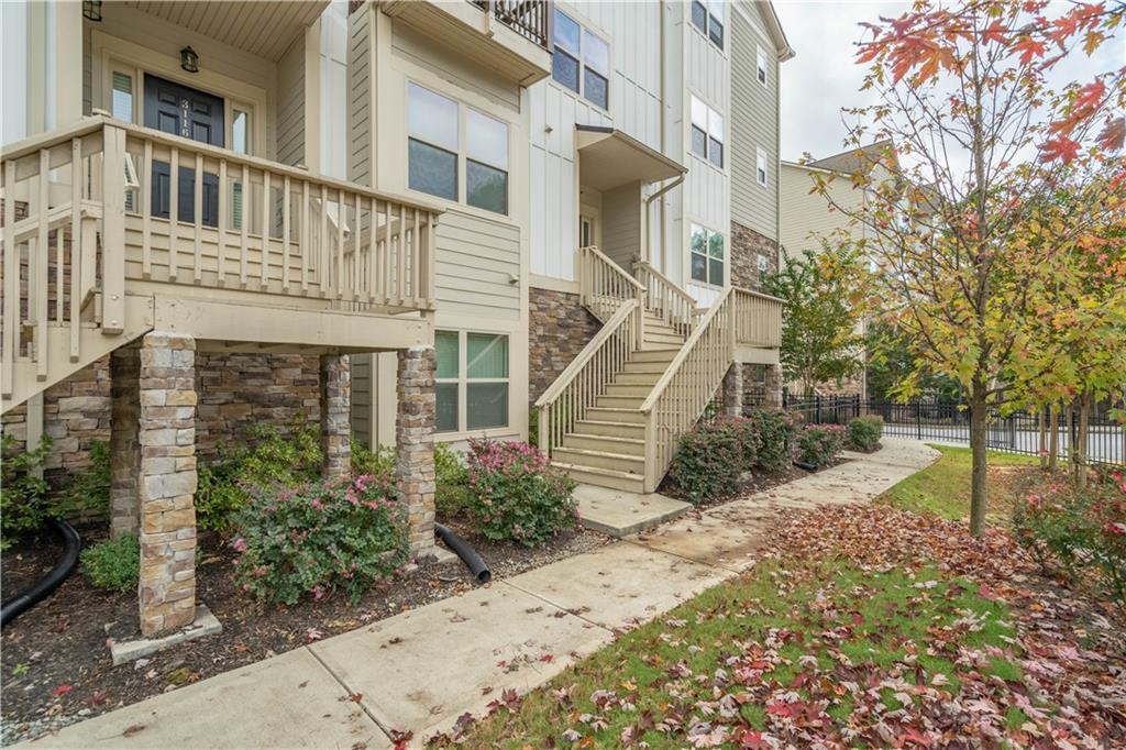 3110 Quantum Lane, Unit 53 Atlanta, GA 30341 - Photo 2 of 38 a view of a house with a yard