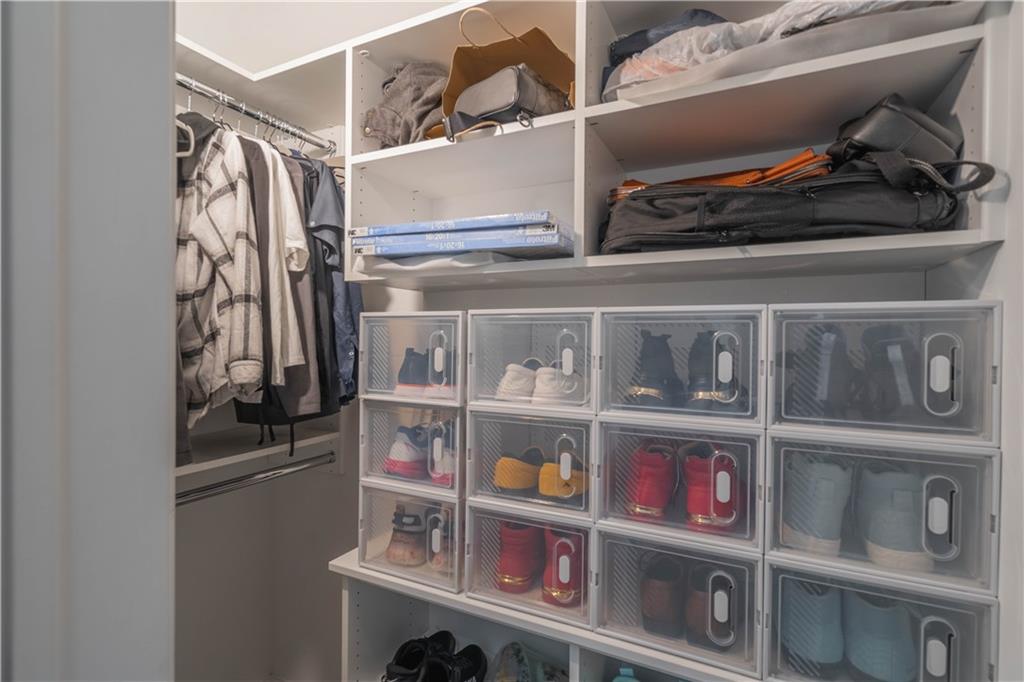 3110 Quantum Lane, Unit 53 Atlanta, GA 30341 - Photo 26 of 38 a view of walk in closet with clothes and shoes