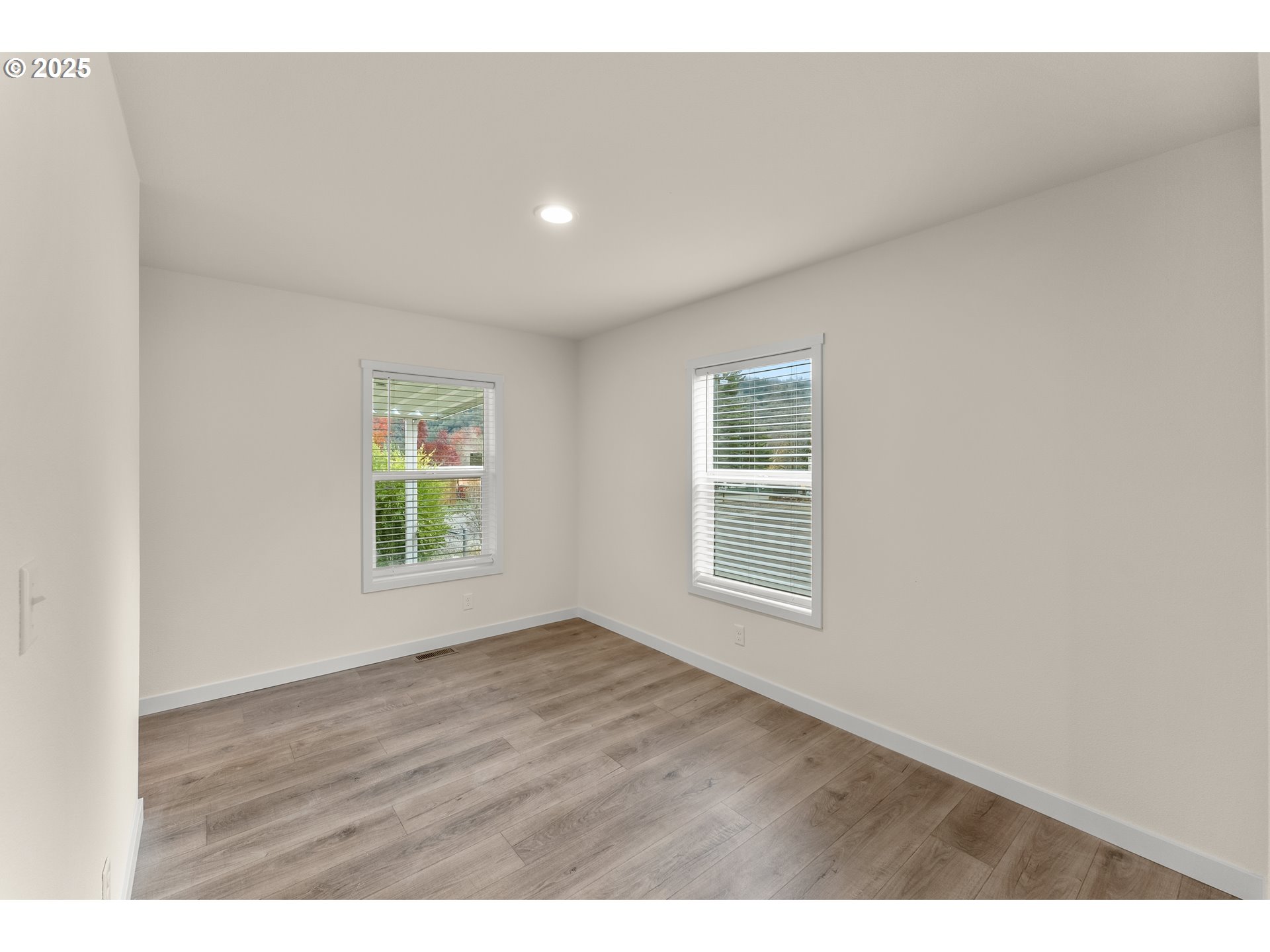 112 Twin Oaks Loop Winston, OR 97496 - Photo 15 of 35 a view of an empty room with a window