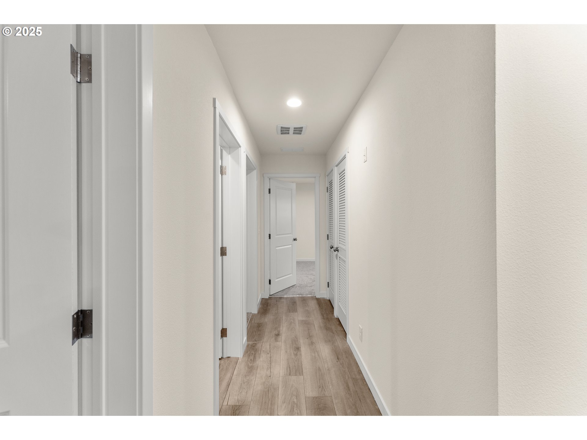 112 Twin Oaks Loop Winston, OR 97496 - Photo 19 of 35 a view of hallway with wooden floor