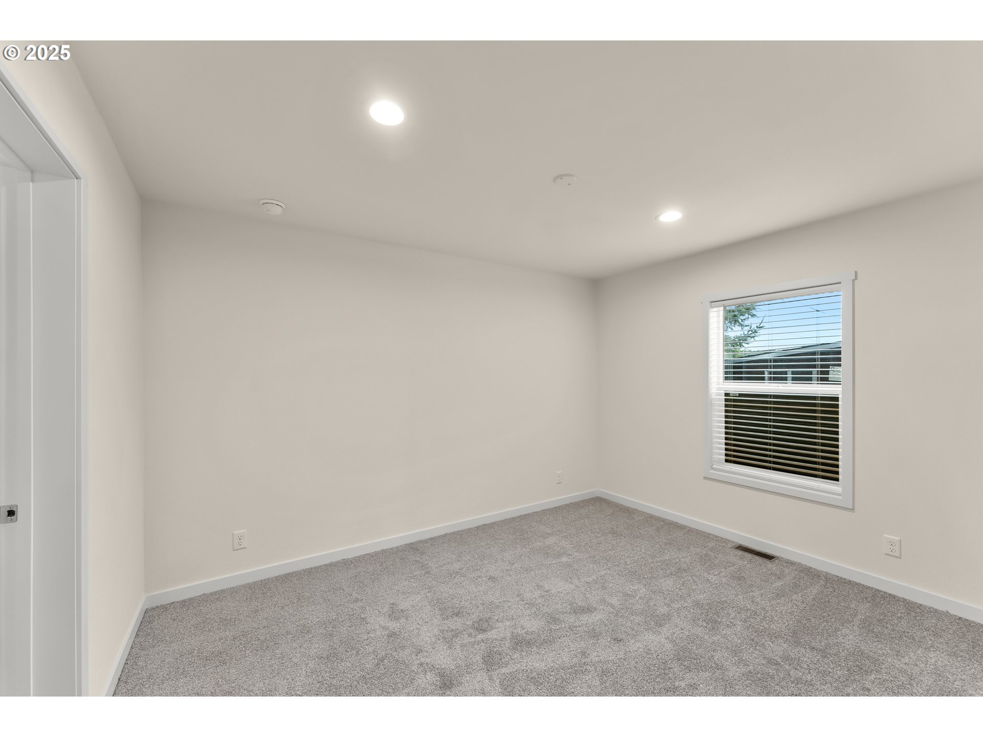 112 Twin Oaks Loop Winston, OR 97496 - Photo 21 of 35 a view of an empty room with a window