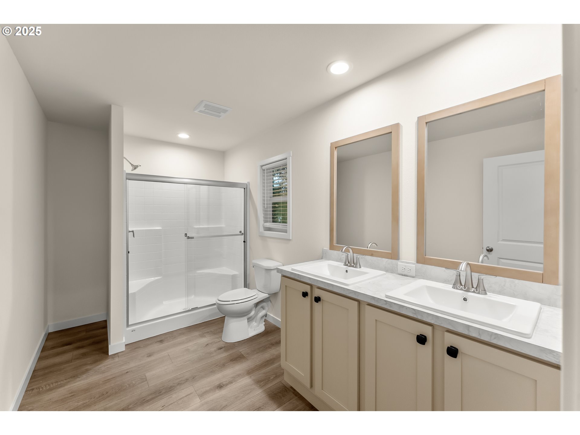 112 Twin Oaks Loop Winston, OR 97496 - Photo 23 of 35 a bathroom with a sink a toilet a large mirror and shower