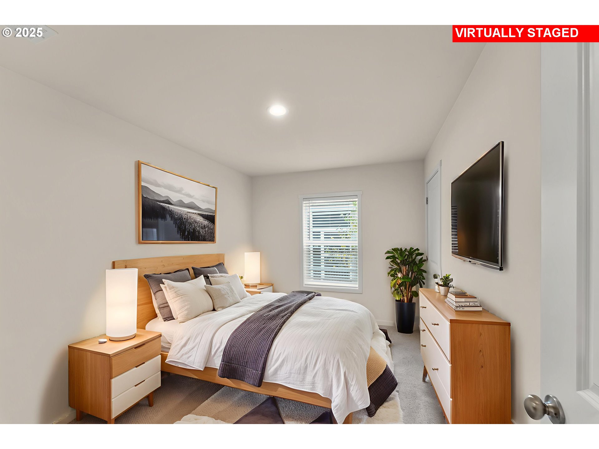 112 Twin Oaks Loop Winston, OR 97496 - Photo 24 of 35 a bedroom with a bed and a flat screen tv