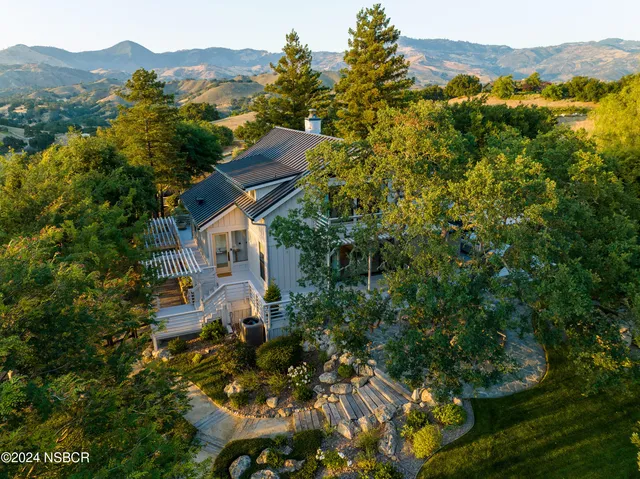 a house view with a garden space
