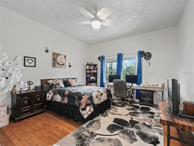 a kitchen with a stove and white cabinets