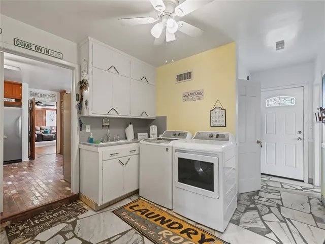 a outdoor living space with patio furniture and a potted plant