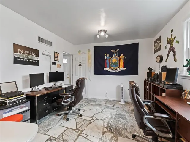 a front view of a house with garden and porch