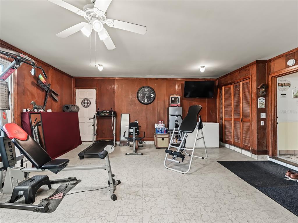 6994 Northwest Highway 320 Micanopy, FL 32667 - Photo 27 of 45 a view of a room with gym equipment