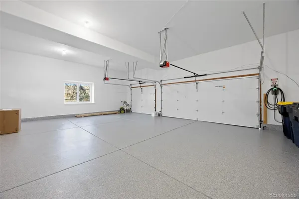 a kitchen with stainless steel appliances granite countertop a sink and wooden cabinets