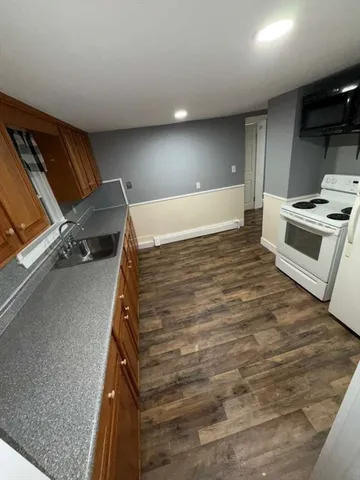 a view of a kitchen with a stove