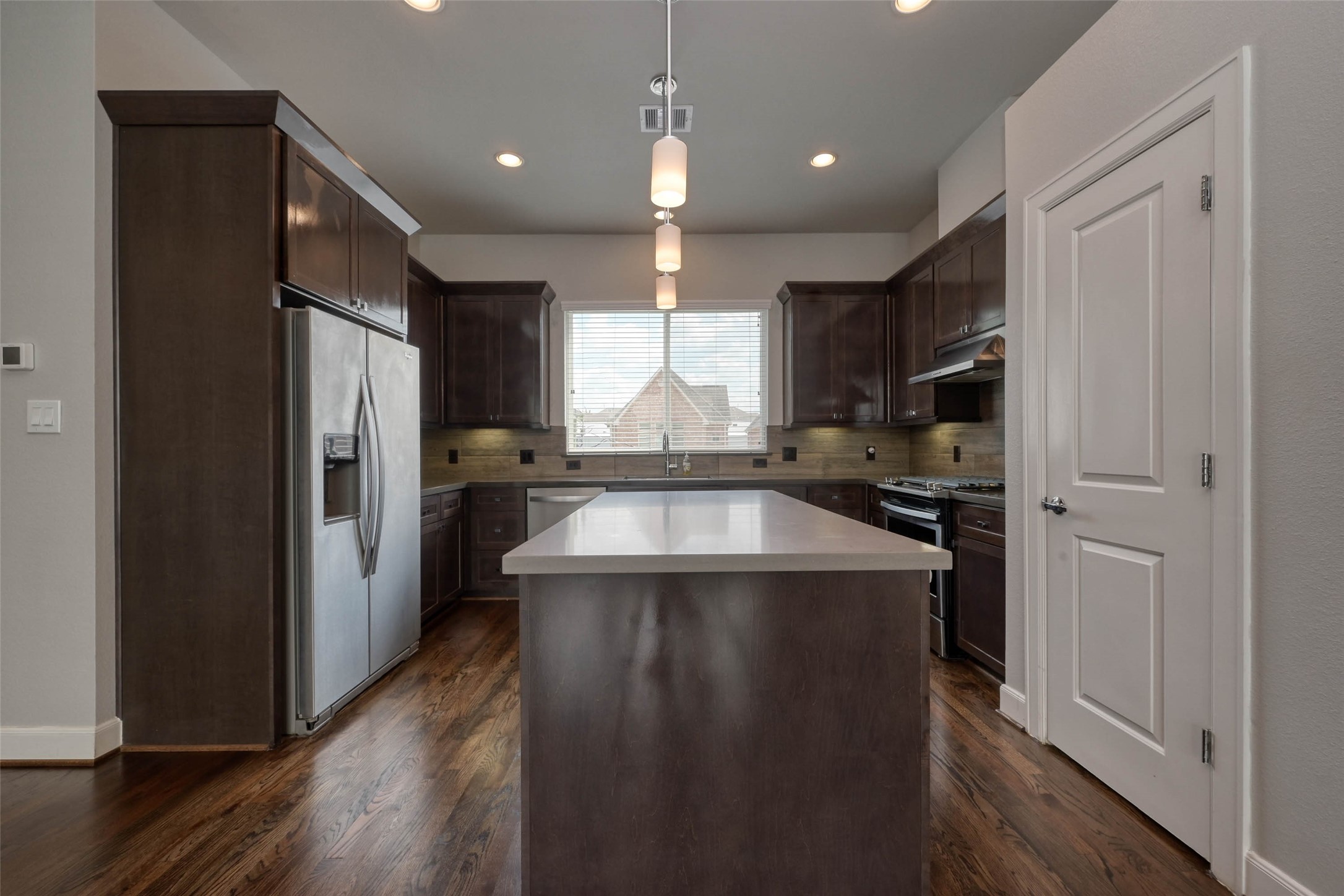 951 West 17th Street Houston, TX 77008 - Photo 11 of 30 This Exquisite Chef's Kitchen Features Beautiful Cabinetry with Under Cabinet Lighting, Soft Closing Drawers and a Large Island.