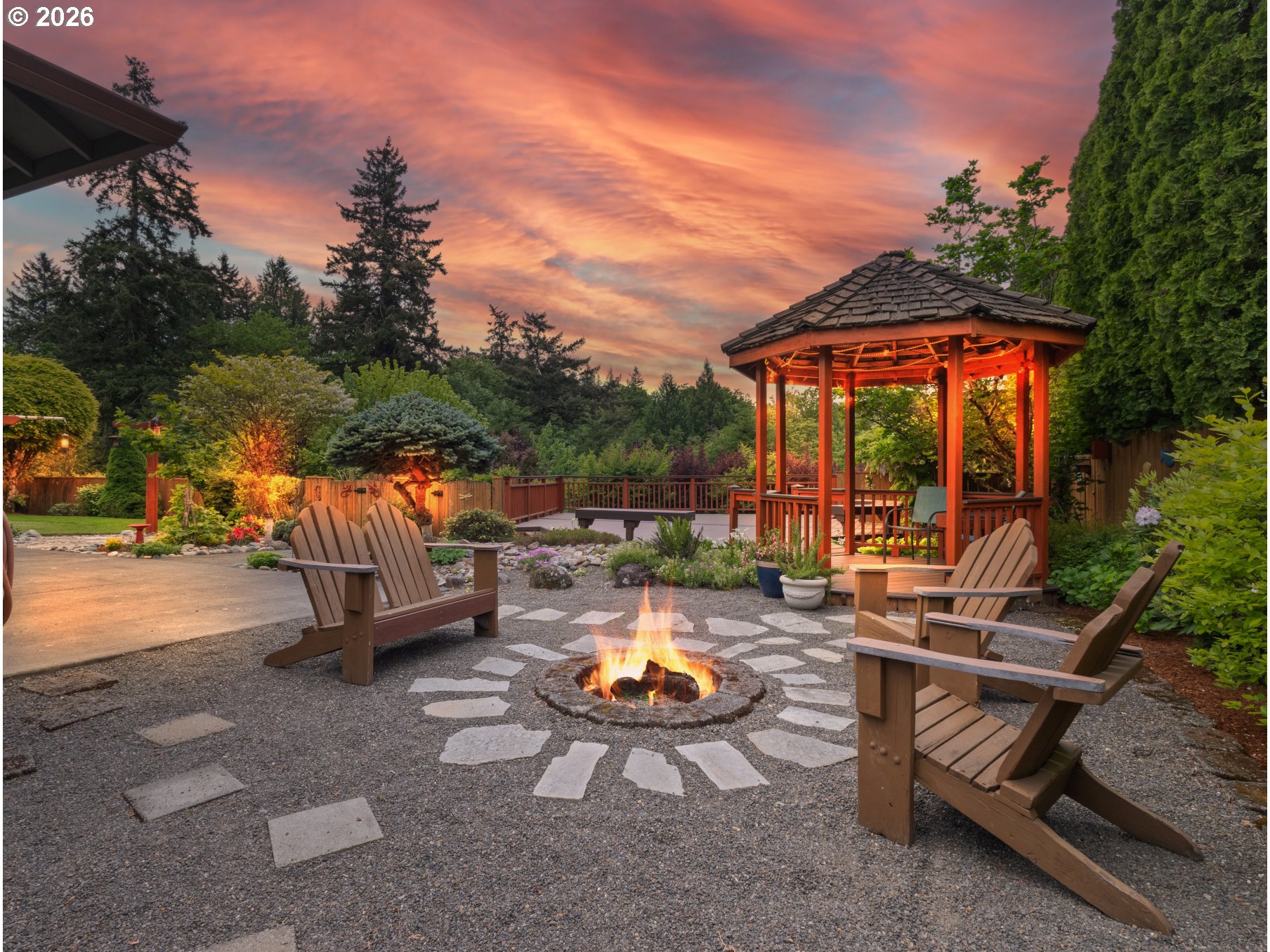 366 Southwest 37th Circle Gresham, OR 97080 - Photo 45 of 47 a view of swimming pool with outdoor seating and trees in the background