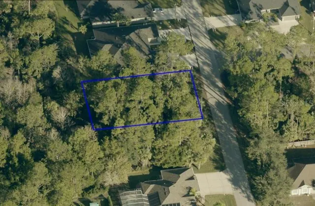 a backyard of a house with yard and outdoor seating