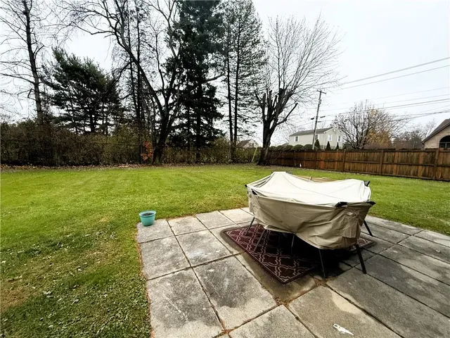 a view of a chairs and table on the terrace