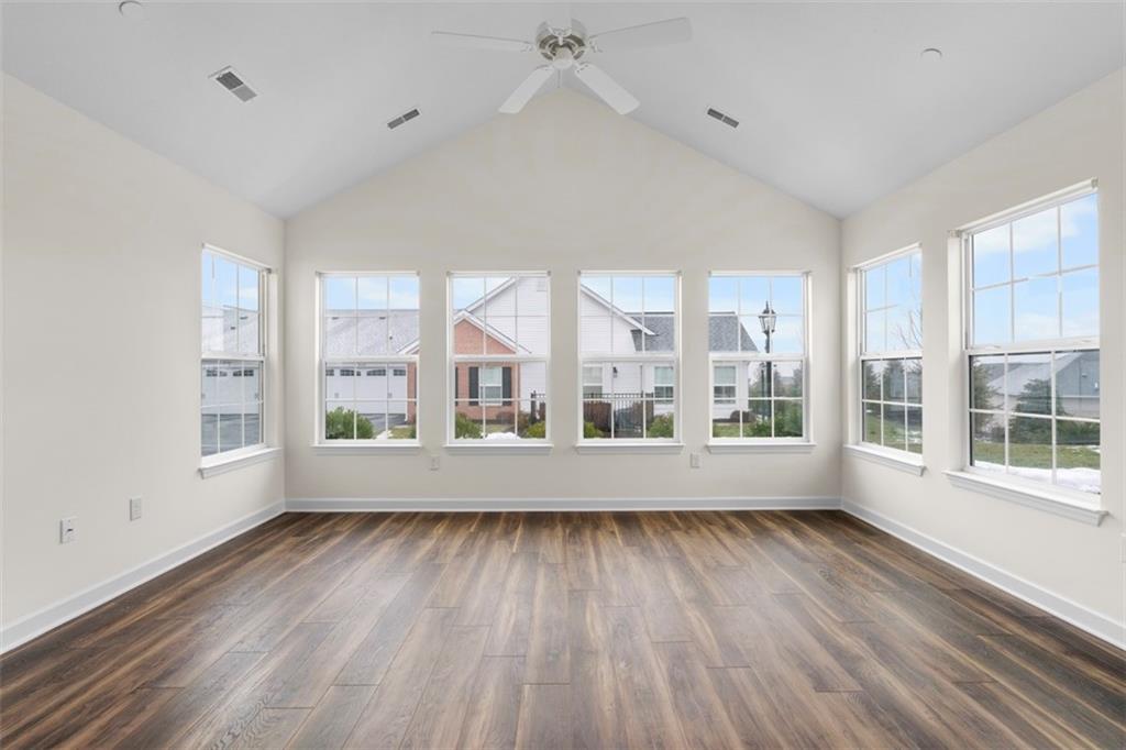 1024 Tilly Drive Valencia, PA 16059 - Photo 14 of 35 a view of an empty room with wooden floor and a window
