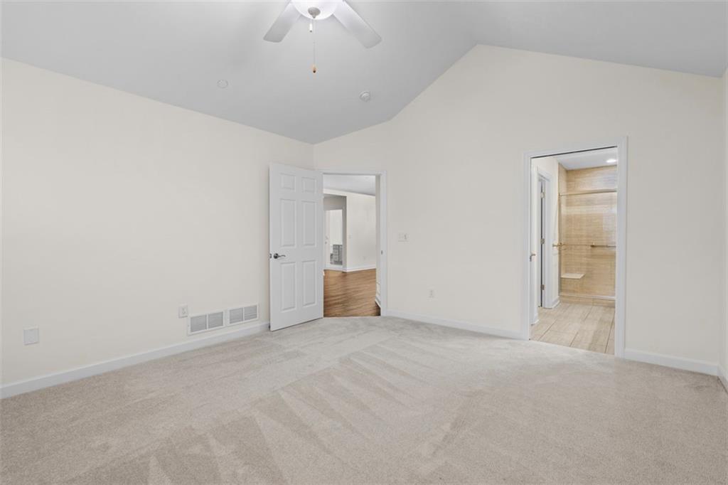 1024 Tilly Drive Valencia, PA 16059 - Photo 16 of 35 en empty room with an entryway and chandelier fan