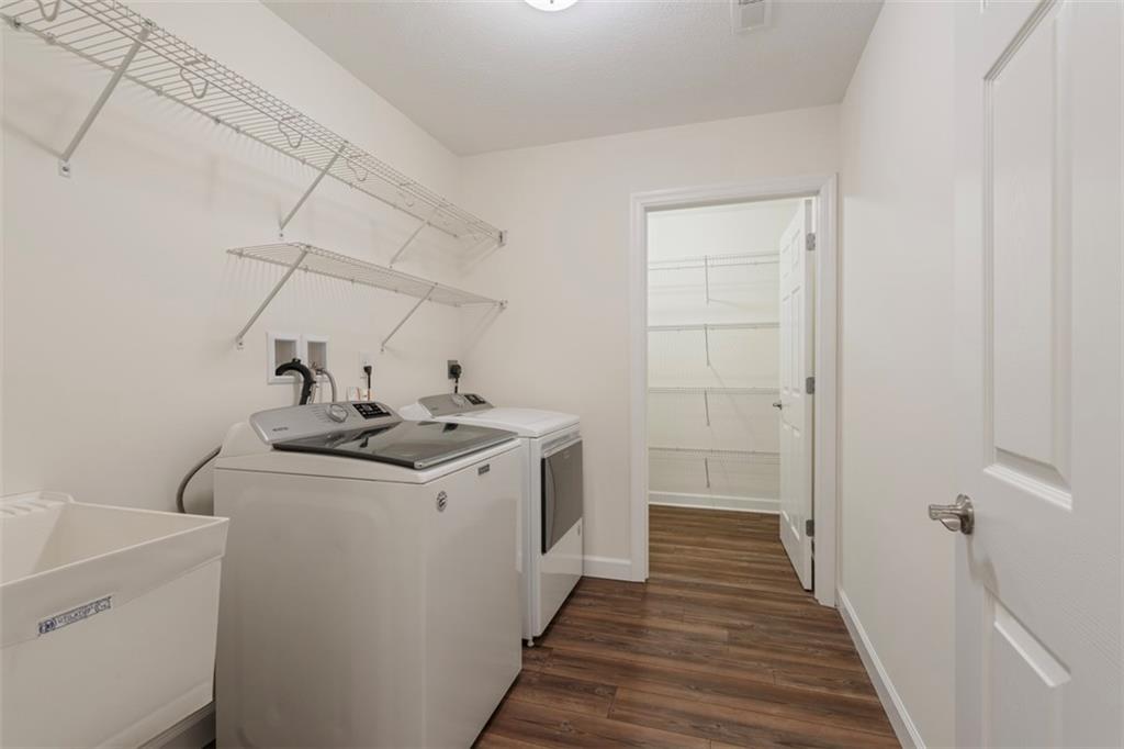 1024 Tilly Drive Valencia, PA 16059 - Photo 24 of 35 a kitchen with a sink and wooden floor