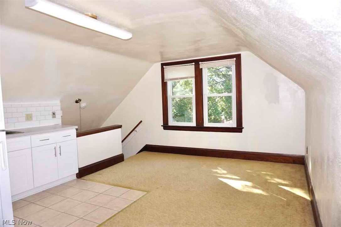 2168 Edgewood Road Cleveland, OH 44118 - Photo 32 of 41 3rd fl eating area with a textured, lofted ceiling, and light tile floors