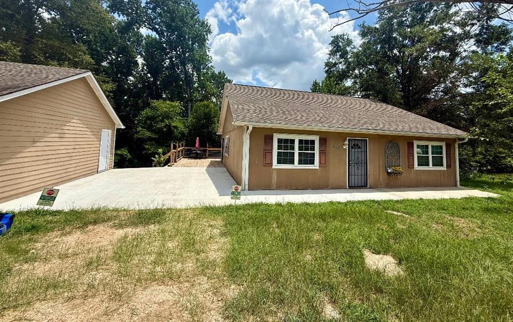 448 North Hill Road Tyler, TX 75706 - Photo 33 of 33 a view of a house with a yard