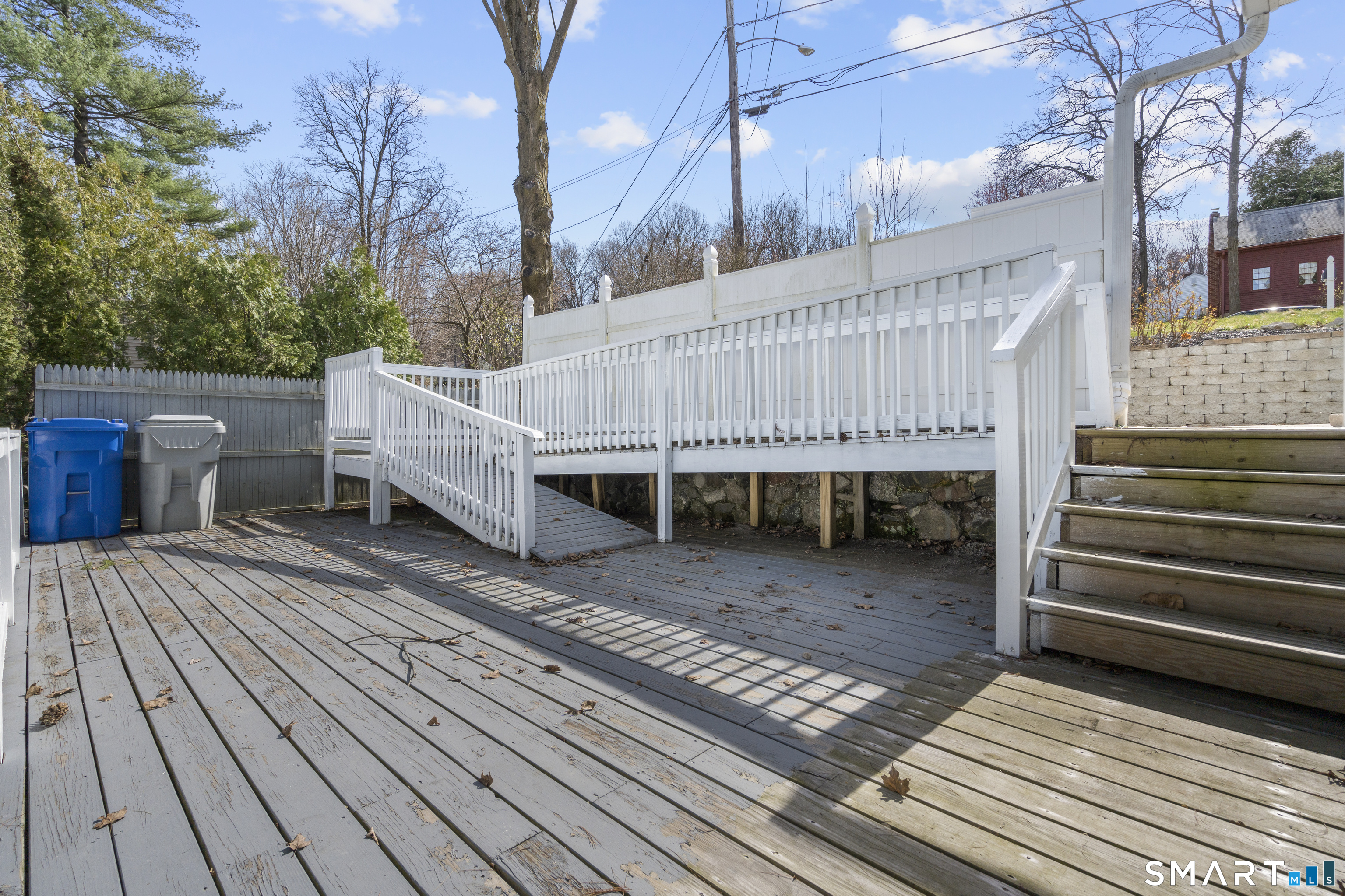 9 Daniel Road, Unit 9B Bristol, CT 06010 - Photo 16 of 16 a view of a wooden deck