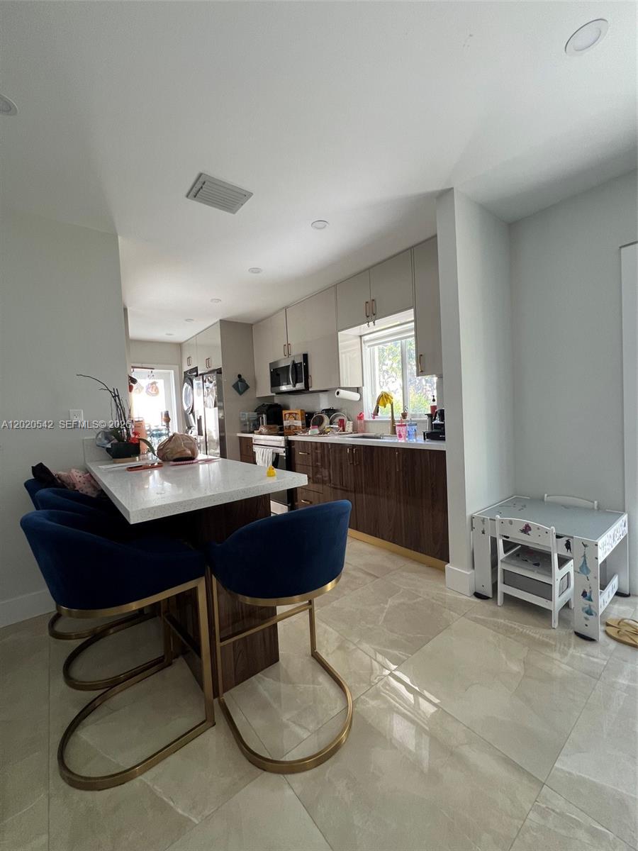 335 West 50th Street Hialeah, FL 33012 - Photo 5 of 13 Kitchen Area