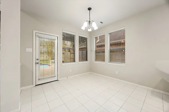 a view of an empty room with window