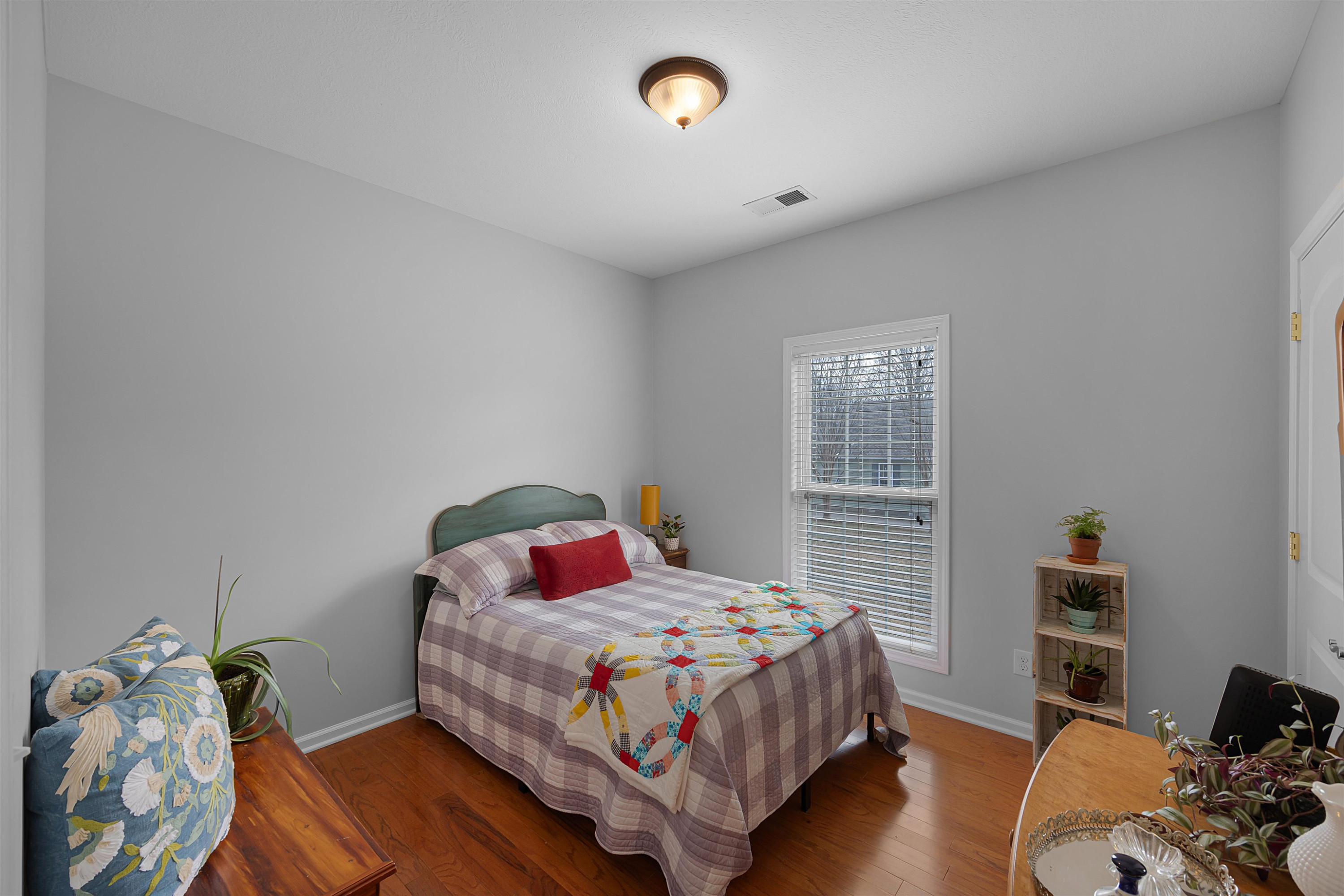 2305 Mockingbird Road Medon, TN 38356 - Photo 14 of 27 a bedroom with a bed and a window