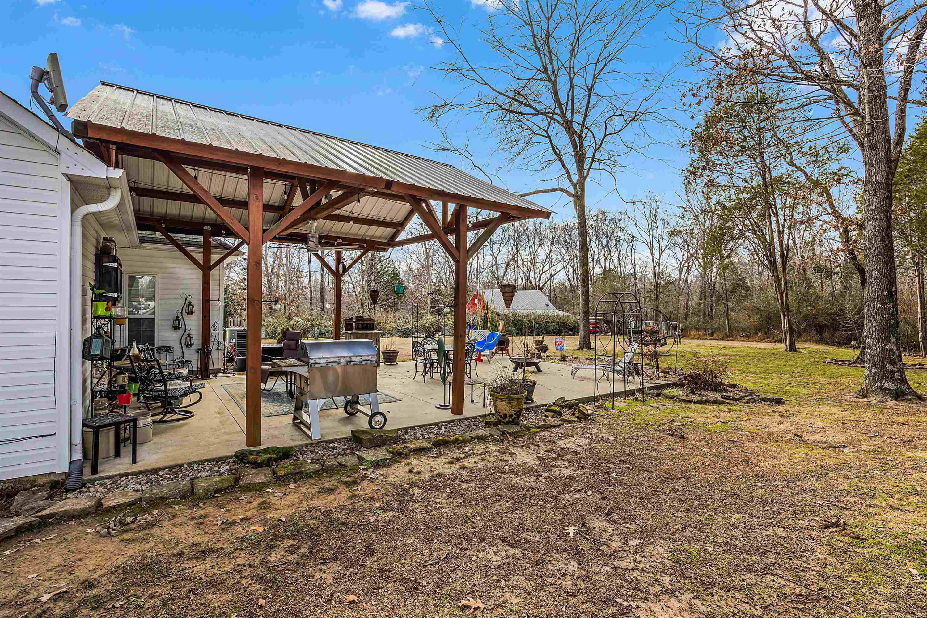 2305 Mockingbird Road Medon, TN 38356 - Photo 3 of 27 a view of a chairs and tables in the patio