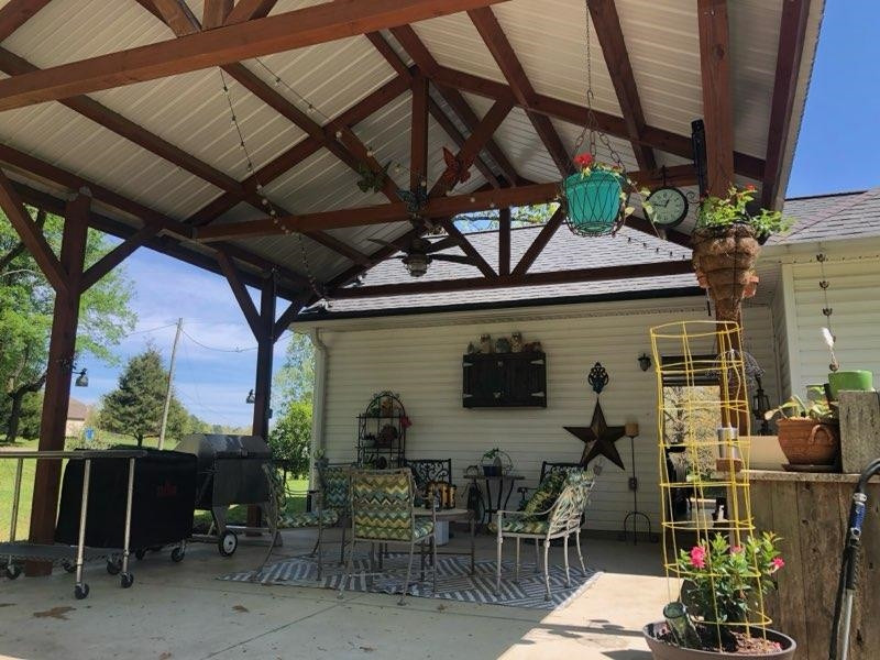 2305 Mockingbird Road Medon, TN 38356 - Photo 5 of 27 a view of a porch with furniture