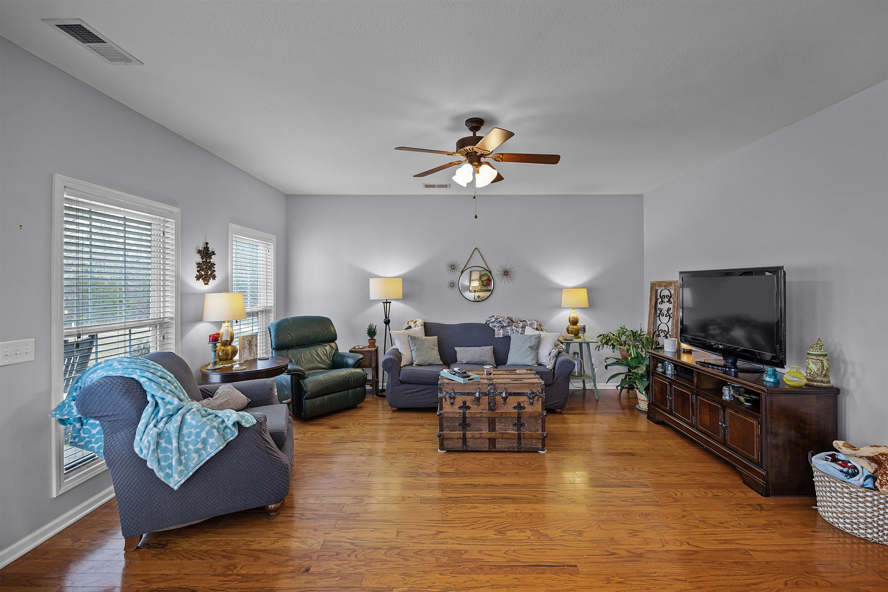 2305 Mockingbird Road Medon, TN 38356 - Photo 10 of 27 a living room with furniture and a flat screen tv