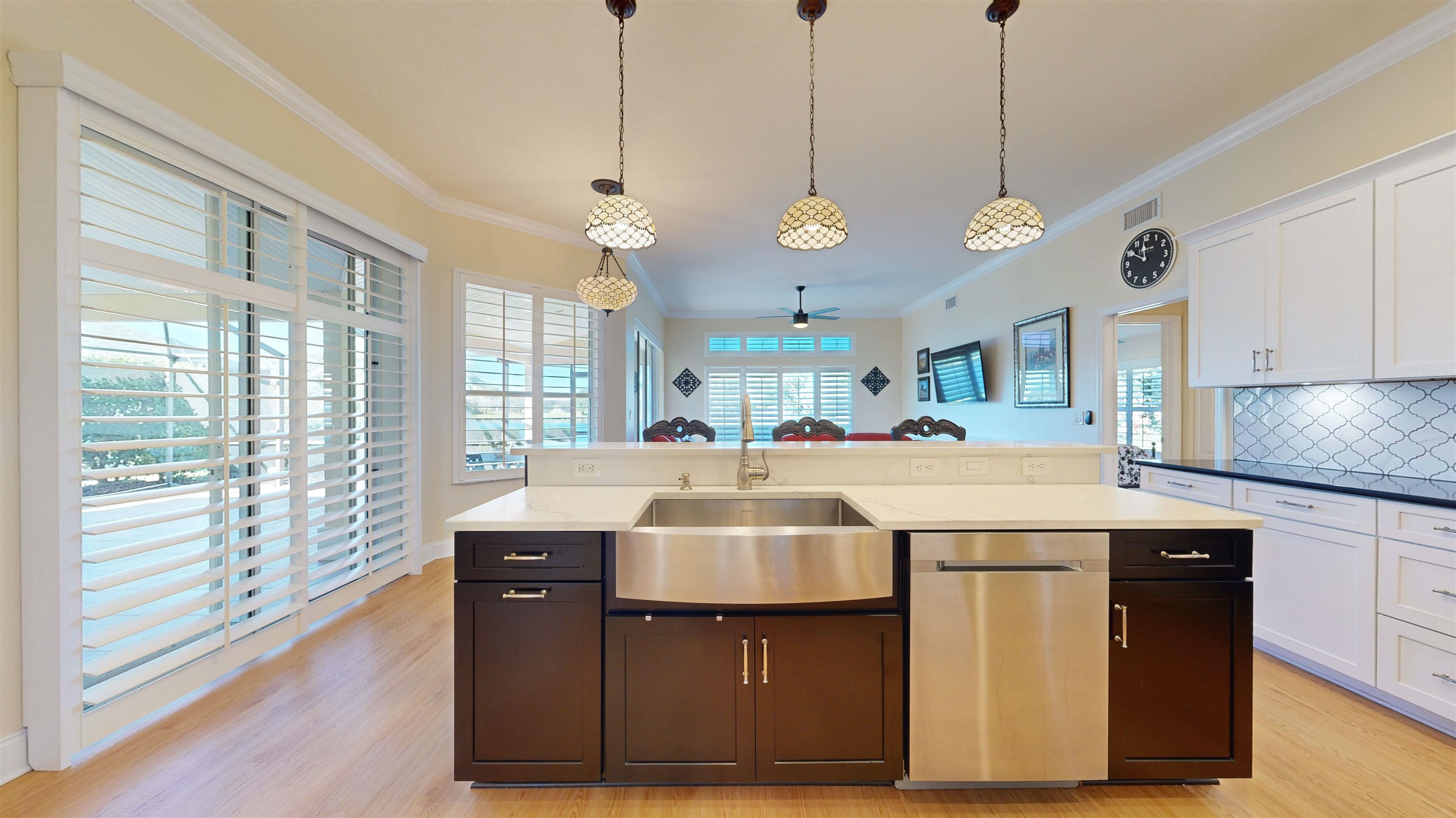 337 San Nicolas Way St. Augustine, FL 32080 - Photo 12 of 23 a spacious kitchen with stainless steel appliances granite countertop a sink a window and a kitchen island
