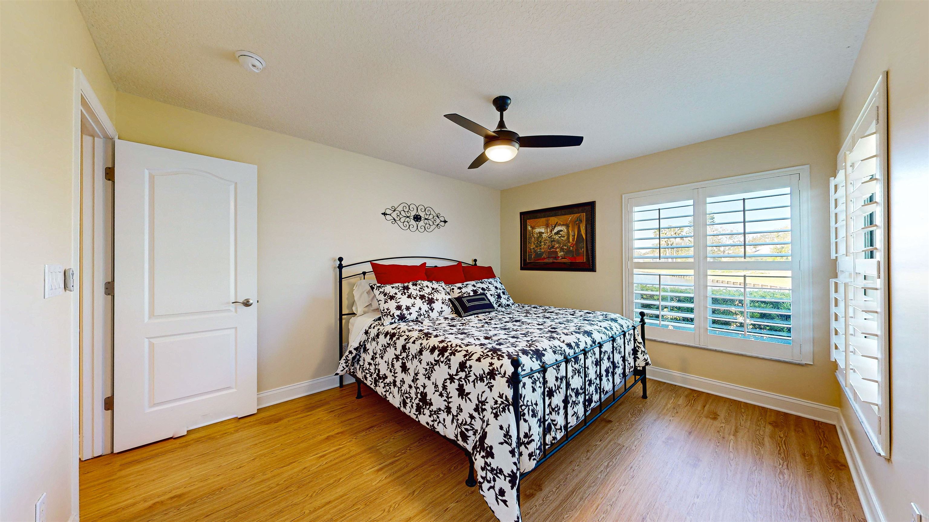 337 San Nicolas Way St. Augustine, FL 32080 - Photo 14 of 23 a bedroom with bed and window