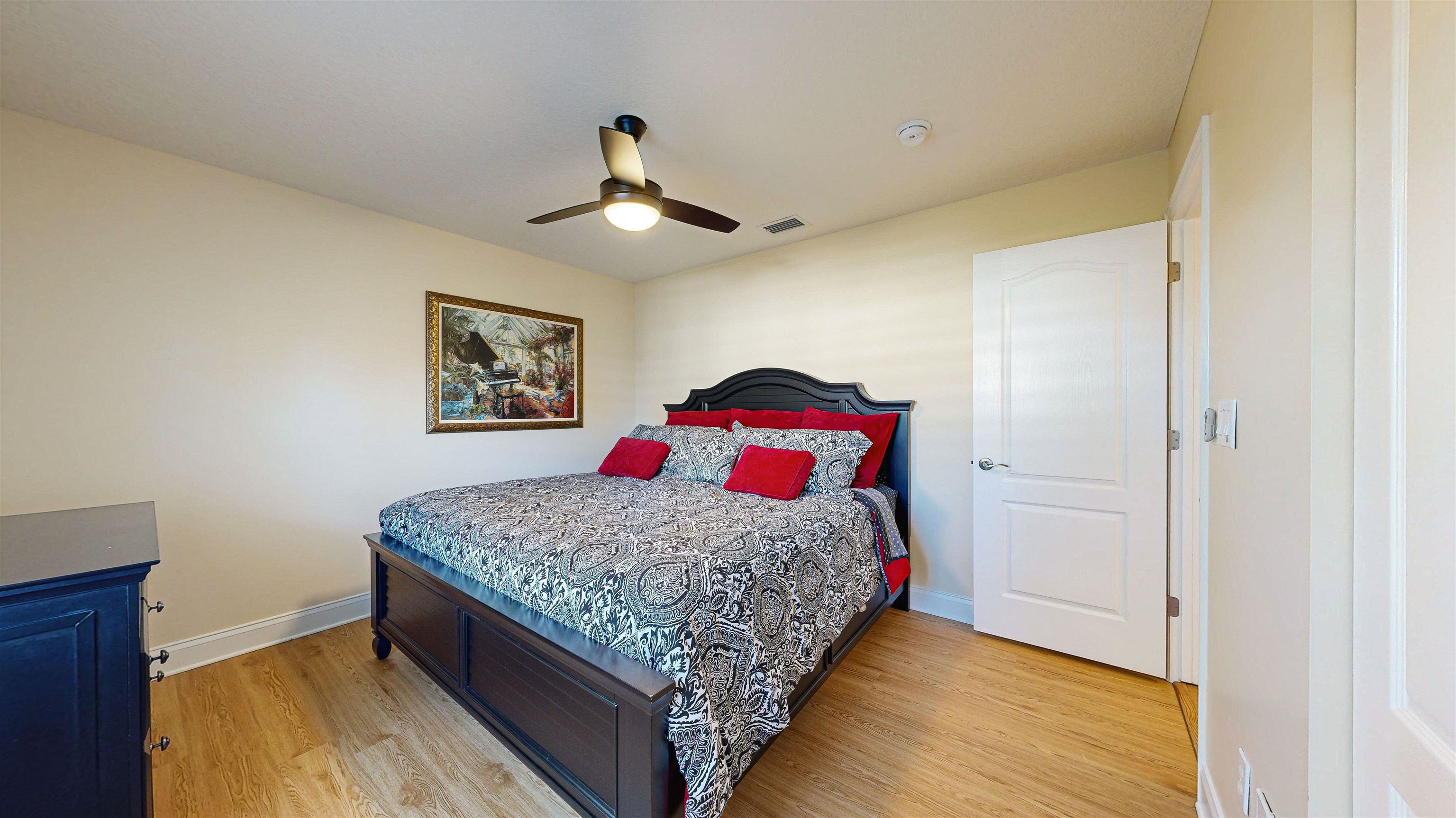 337 San Nicolas Way St. Augustine, FL 32080 - Photo 15 of 23 a bedroom with a bed and a dresser