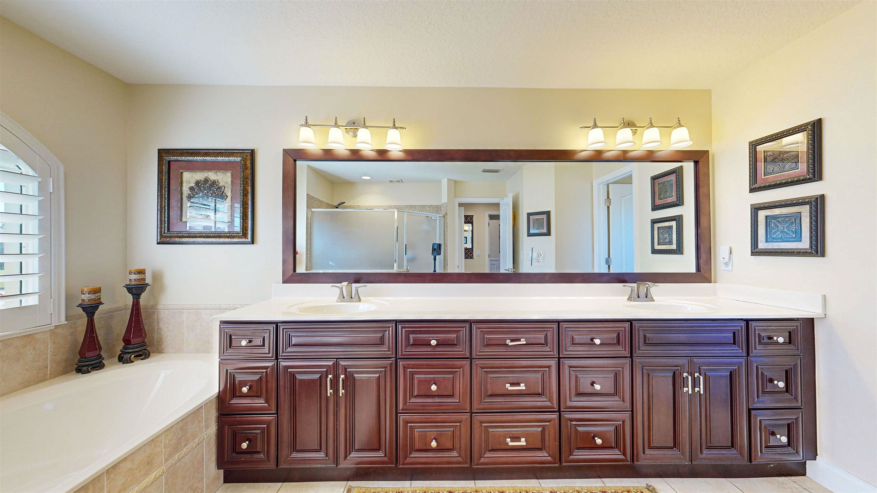 337 San Nicolas Way St. Augustine, FL 32080 - Photo 18 of 23 a view of a bedroom with furniture and wooden floor