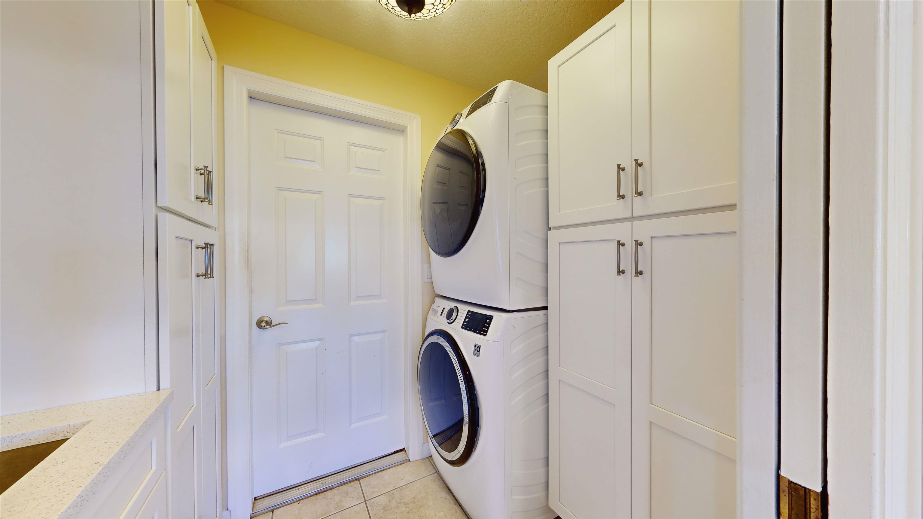 337 San Nicolas Way St. Augustine, FL 32080 - Photo 23 of 23 a utility room with dryer and washer