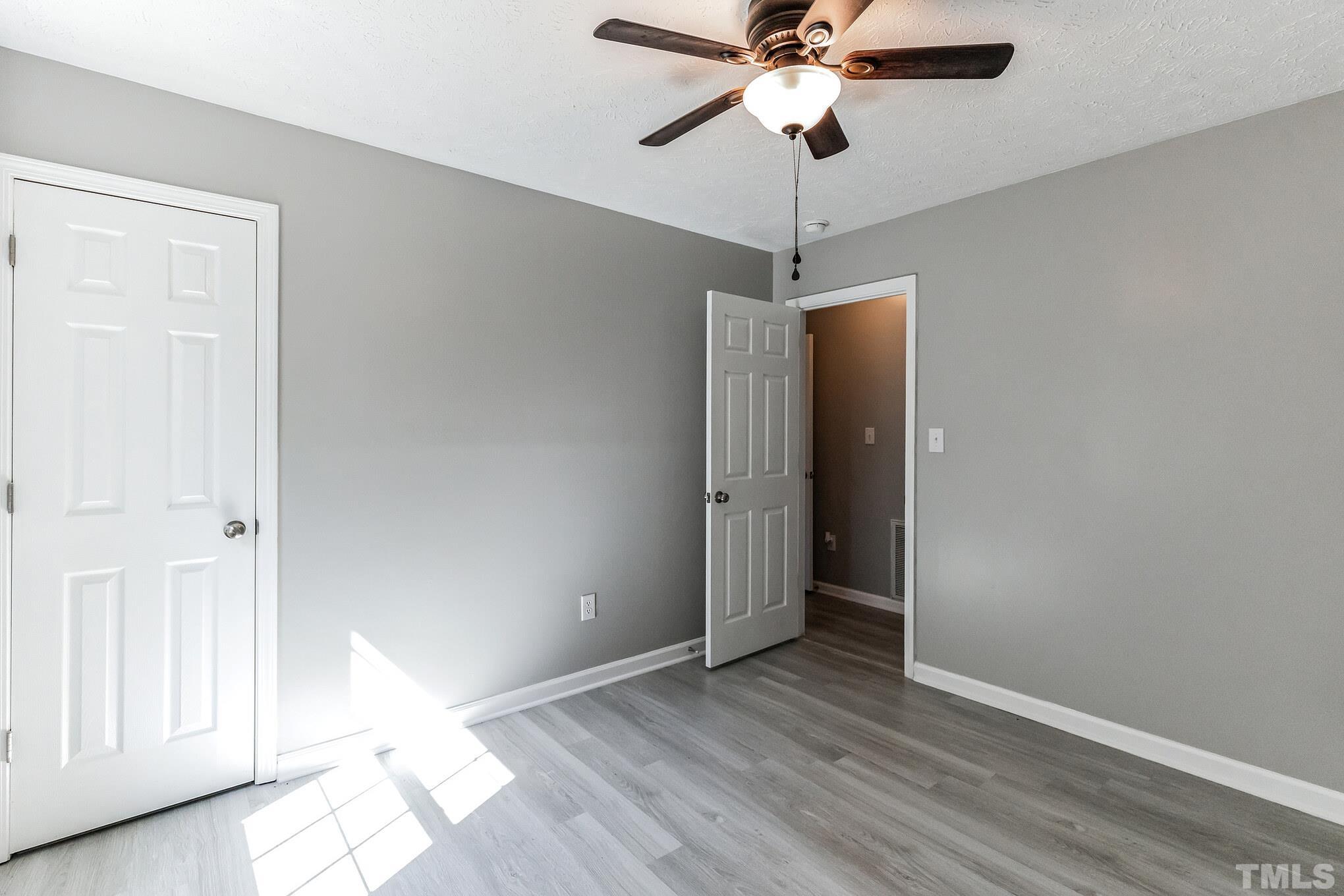 3763 Waycross Road Magnolia, NC 28453 - Photo 16 of 34 a view of an empty room with a window