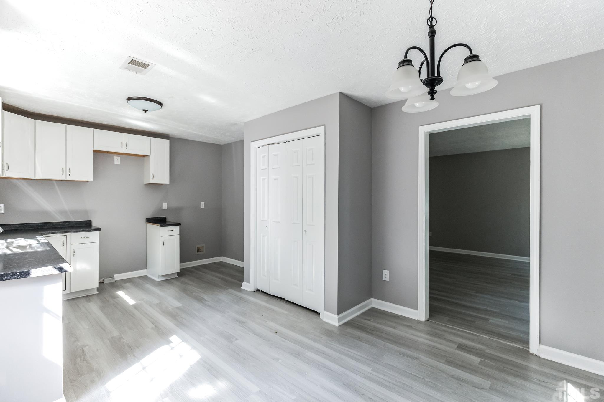 3763 Waycross Road Magnolia, NC 28453 - Photo 20 of 34 a view of a kitchen with electric appliances