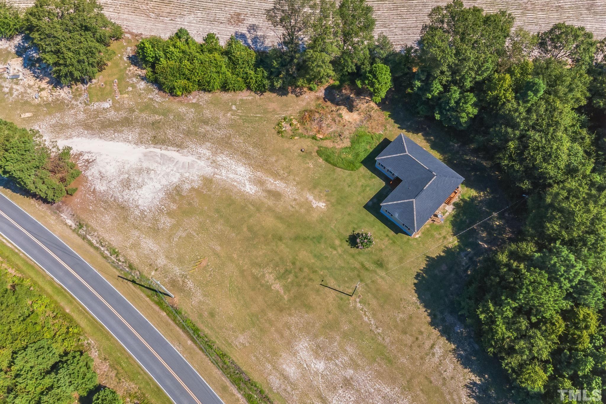 3763 Waycross Road Magnolia, NC 28453 - Photo 23 of 34 a view of a yard with plants