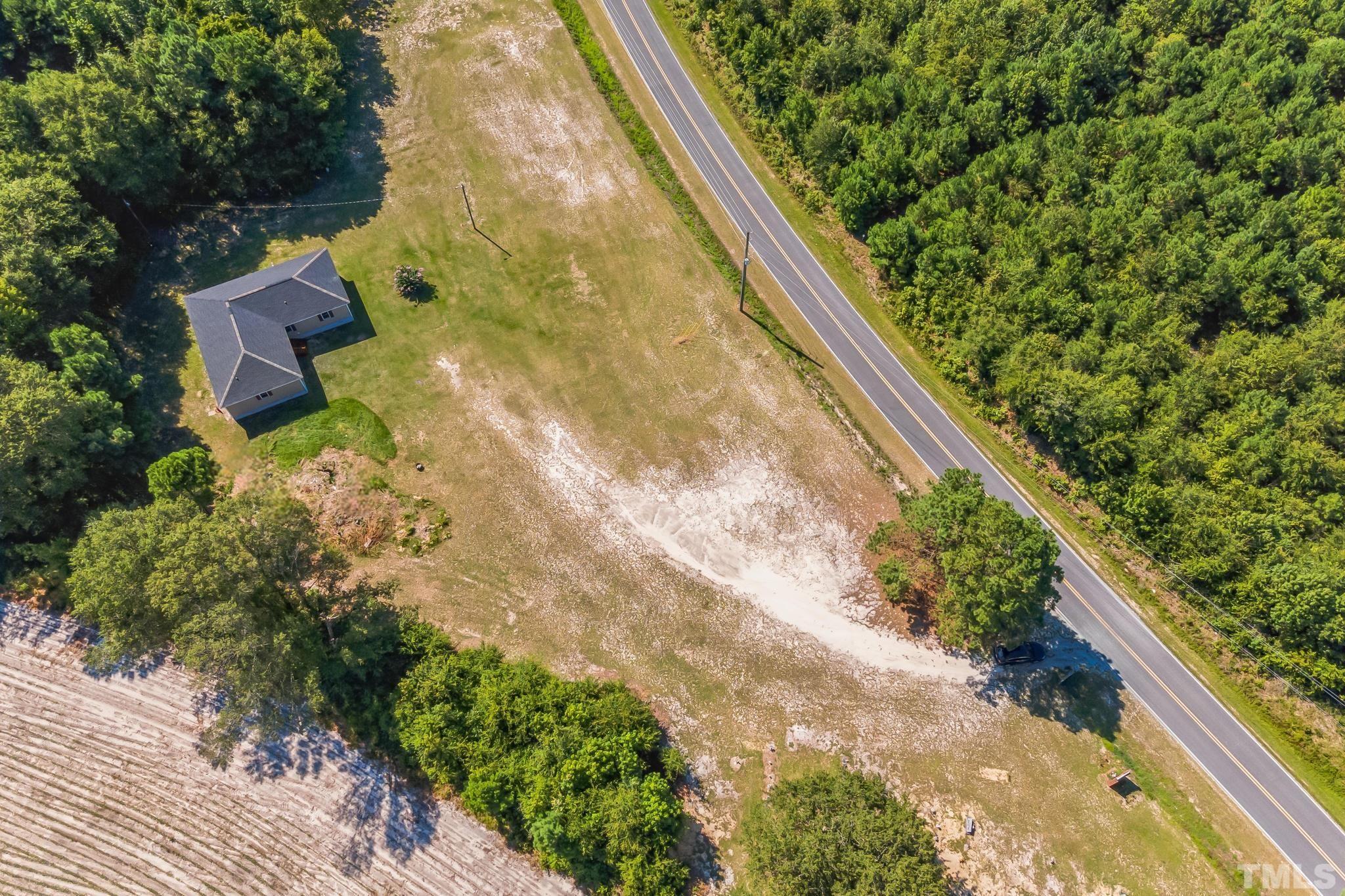 3763 Waycross Road Magnolia, NC 28453 - Photo 31 of 34 a view of a yard with plants