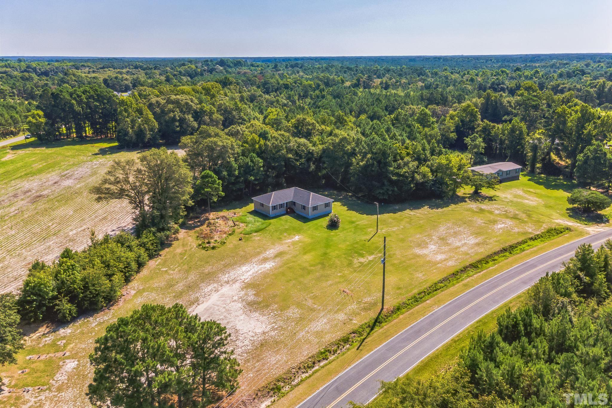 3763 Waycross Road Magnolia, NC 28453 - Photo 34 of 34 a view of a yard and an ocean