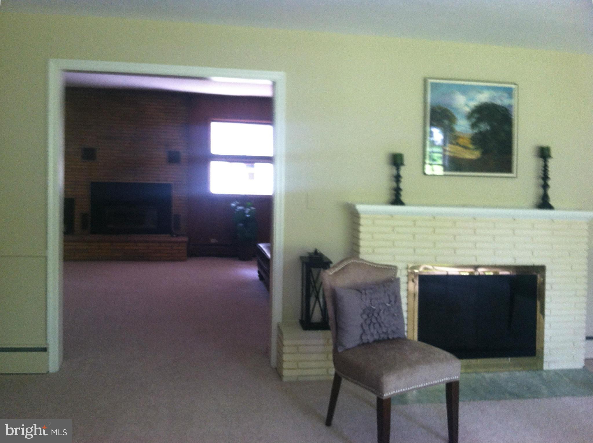 6431 Overhill Road Falls Church, VA 22042 - Photo 5 of 30 Living Room - Showing both Fireplaces