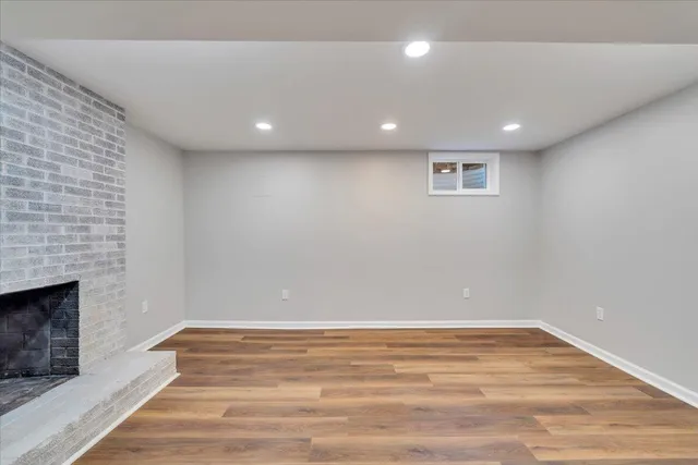 a view of a room with wooden walls